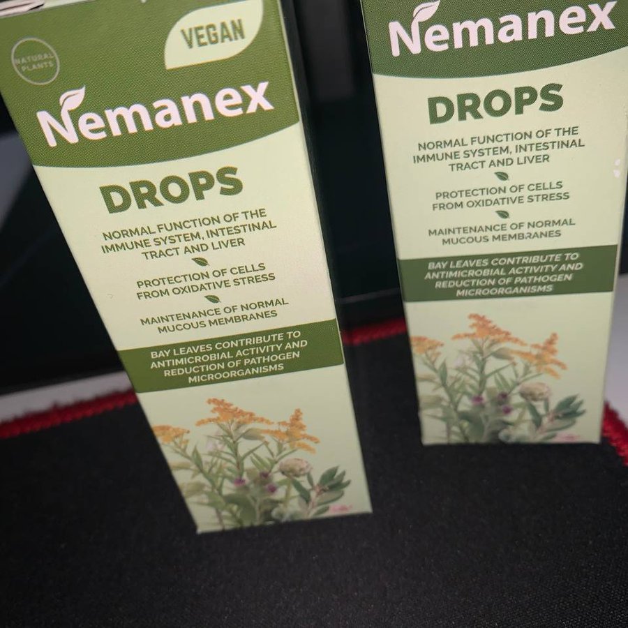 Frasco ámbar de Nemanex Drops con su caja